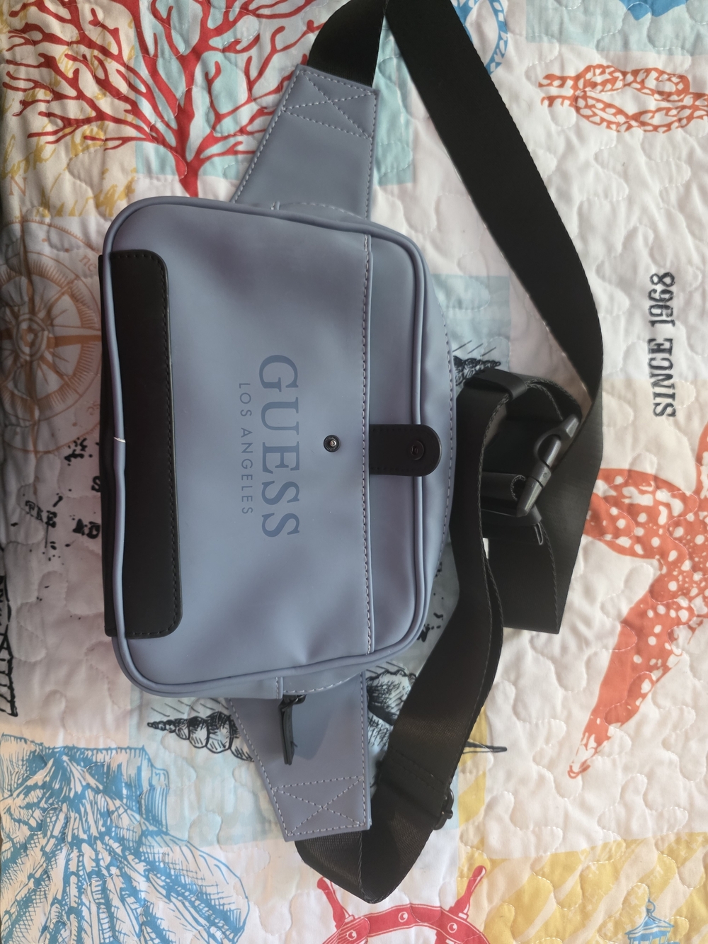 GUESS Los Angeles Light Blue Crossbody Bag with Black Strap